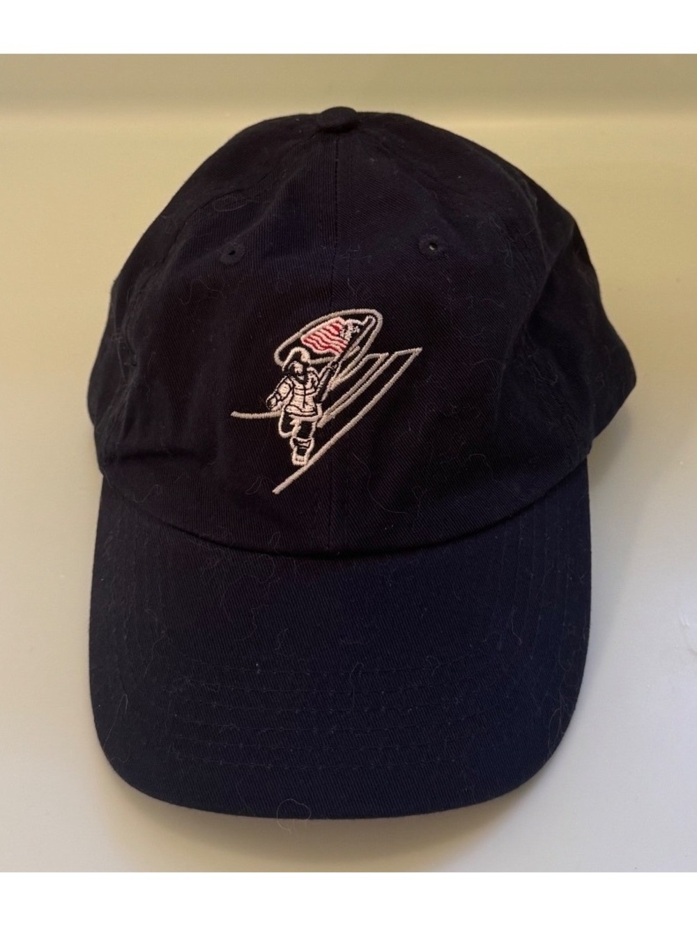 Black Cotton Baseball Cap with Embroidered Skier Design